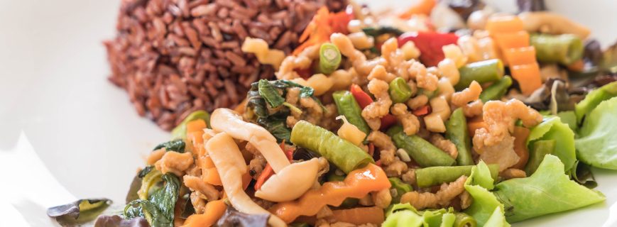 berry rice with stir-fried tofu protein and basil  - vegan food
