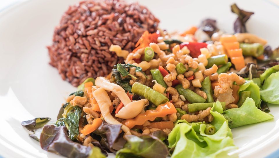 berry rice with stir-fried tofu protein and basil  - vegan food
